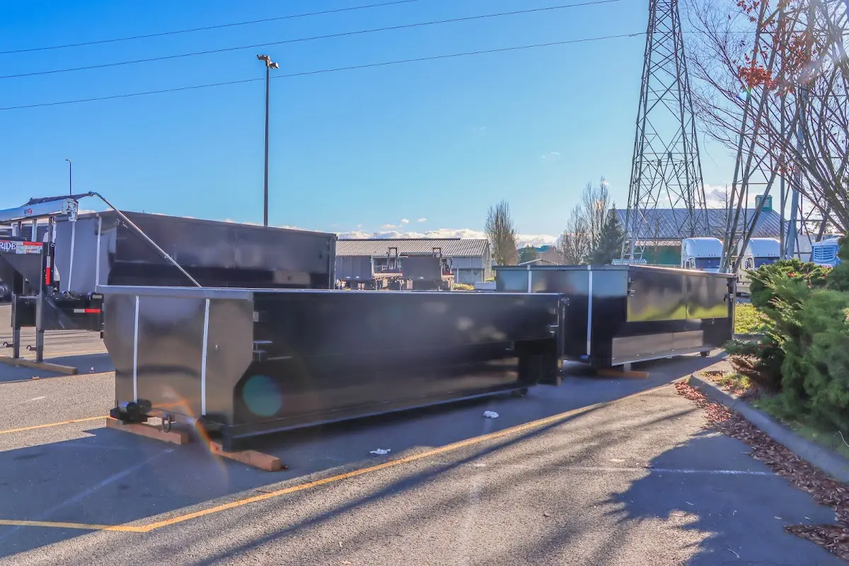 Roll-off dumpster ready for waste disposal at job site for 10 Yard Dumpster Rental in Natchez